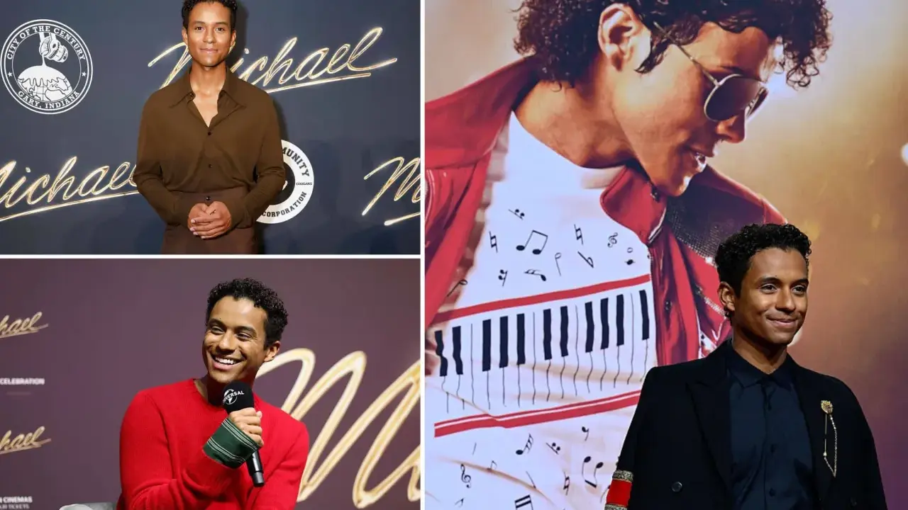 Jaafar Jackson, che interpreta Michael Jackson nel film, sorride con un completo nero e una giacca con dettagli dorati.