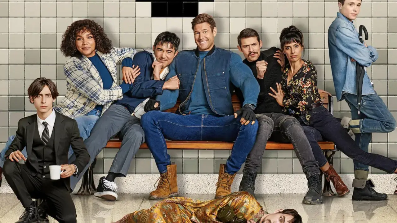 Il cast di Umbrella Academy 4 seduto su una panchina, con uno sdraiato a terra.