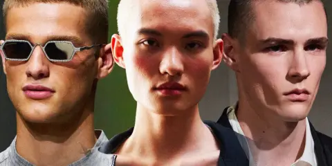 Tre volti con capelli cortissimi, un uomo con occhiali decorati, un altro con un taglio buzz cut donna, e un terzo con sguardo intenso.