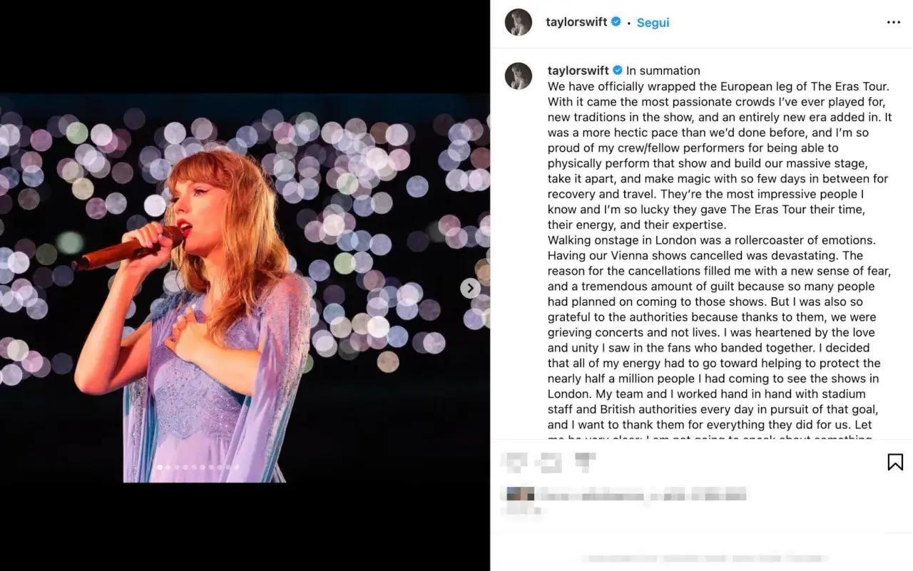 Taylor Swift canta sul palco, con uno sfondo sfocato di luci. Ricorda i suoi concerti a Vienna.
