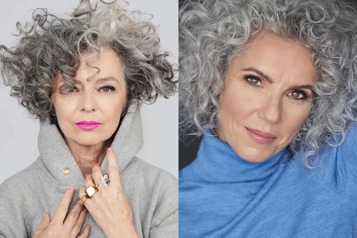 Due donne over 50 con capelli corti mossi spettinati, una con felpa grigia e labbra fucsia, l'altra con dolcevita blu.